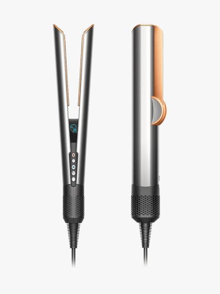 Dyson Airstrait in gold and silver colorway on light gray background